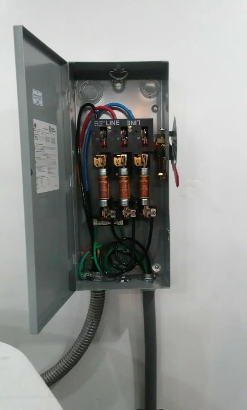 Three-phase disconnect switch installed for Smoke Detector Installation in Kenner
